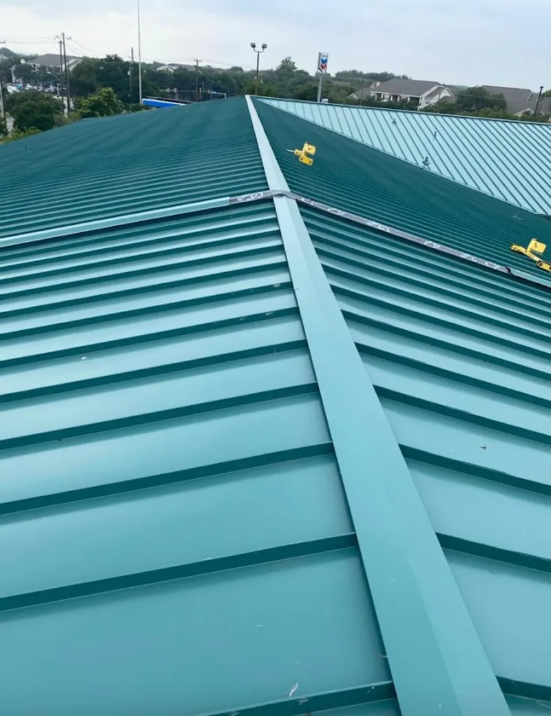 Green commercial metal roof ridge and valley for Metal Roof Repair in Doney Park