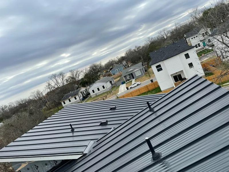 Standing seam metal roof panels with vents for Skylight Repair in Doney Park